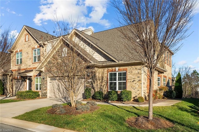 view of front of house with a front lawn and a garage