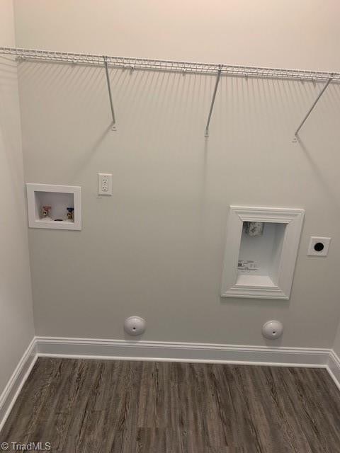 laundry area featuring washer hookup, dark wood-type flooring, and hookup for an electric dryer