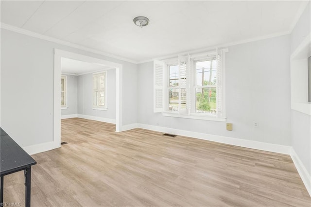 1414 E 3rd St, Winston-Salem, NC 27101 - unfurnished room featuring light wood finished floors and ornamental molding