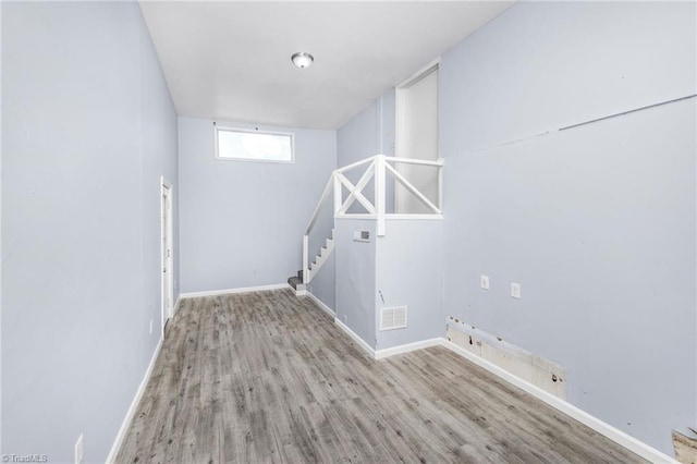 1414 E 3rd St, Winston-Salem, NC 27101 - washroom featuring wood finished floors and baseboards