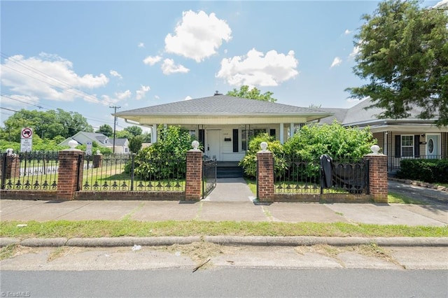 1414 E 3rd St, Winston-Salem, NC 27101 - bungalow-style home with a fenced front yard and covered porch