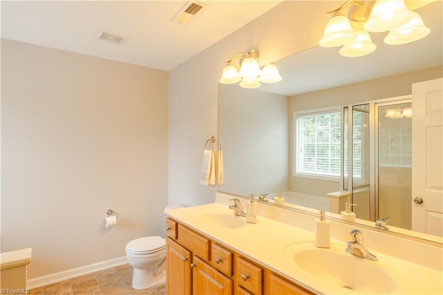 full bathroom featuring an inviting chandelier, vanity, plus walk in shower, and toilet