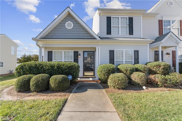 view of front of home featuring a front yard