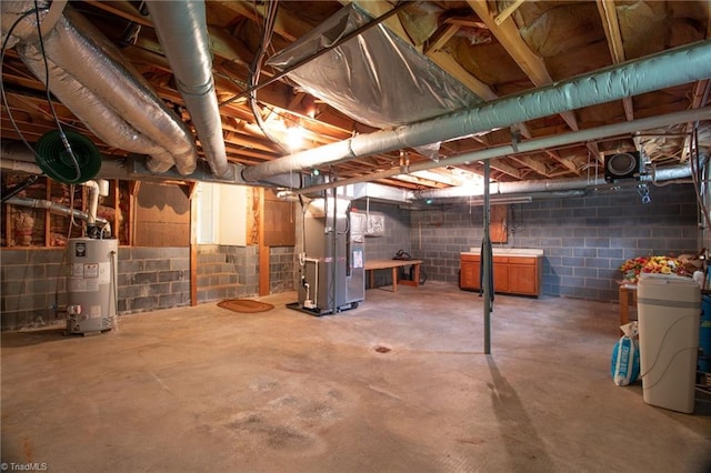 basement with heating unit and gas water heater