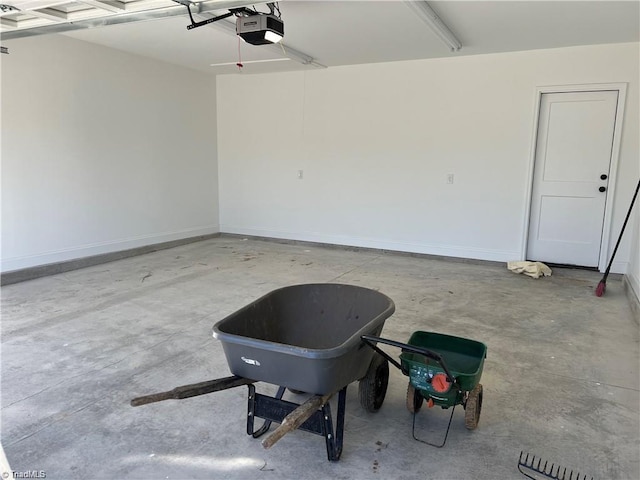 garage featuring a garage door opener