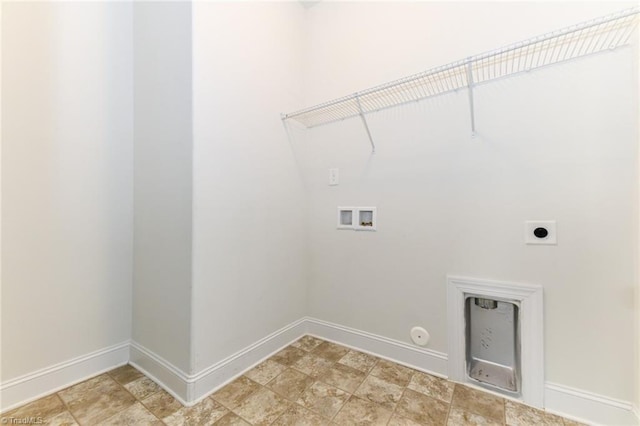 clothes washing area with electric dryer hookup, hookup for a gas dryer, and washer hookup