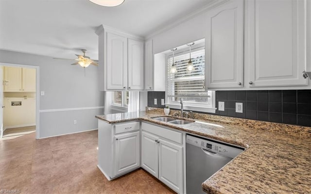 kitchen featuring ceiling fan, light stone countertops, dishwasher, white cabinetry, and a sink