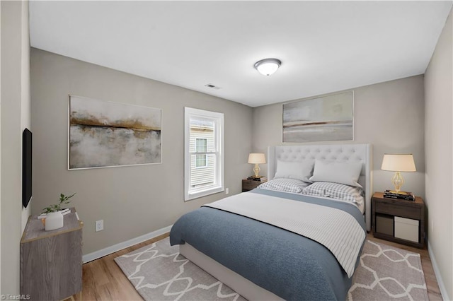 bedroom featuring light hardwood / wood-style flooring