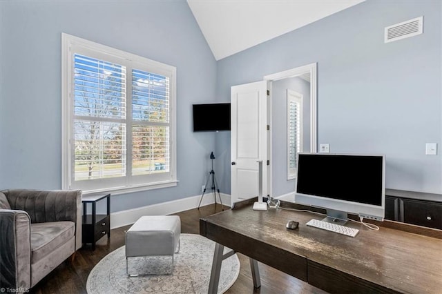 office area with dark hardwood / wood-style flooring and vaulted ceiling