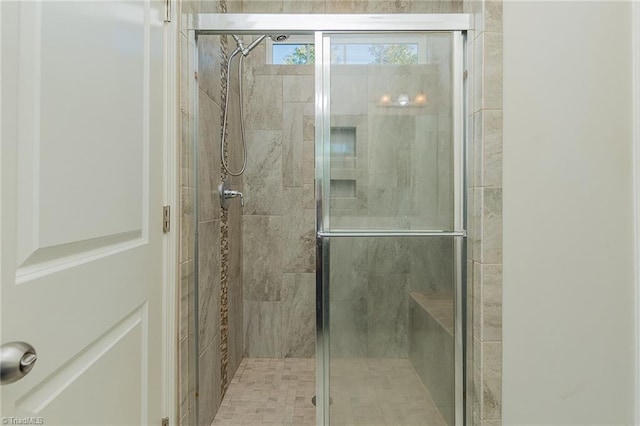 bathroom with an enclosed shower