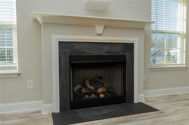 interior details featuring hardwood / wood-style flooring