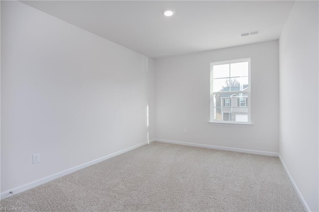 empty room with carpet floors