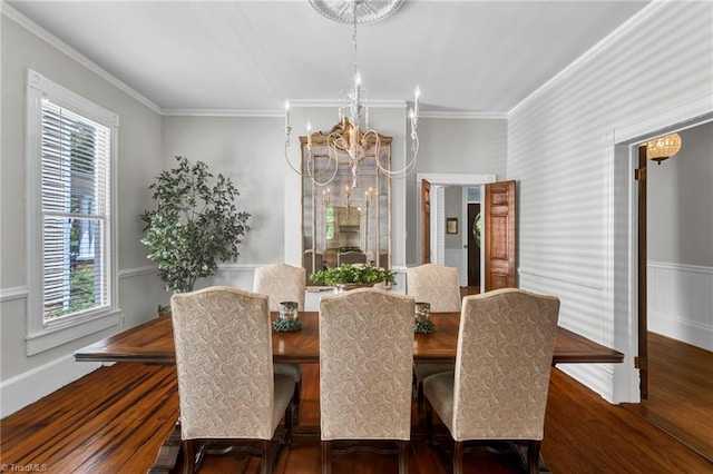 638 N Spring St, Winston-Salem, NC 27101 - dining room featuring a chandelier, wood finished floors, and crown molding