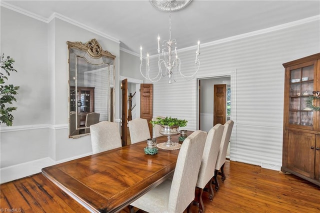 638 N Spring St, Winston-Salem, NC 27101 - dining space with a chandelier, ornamental molding, wood finished floors, and baseboards