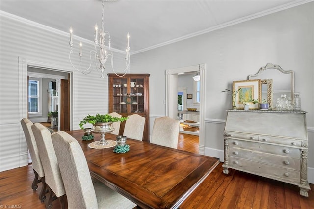 638 N Spring St, Winston-Salem, NC 27101 - dining space with a chandelier, ornamental molding, hardwood / wood-style flooring, and baseboards