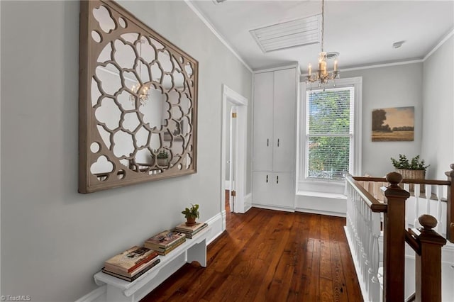 638 N Spring St, Winston-Salem, NC 27101 - foyer entrance with hardwood / wood-style floors, ornamental molding, a chandelier, and baseboards