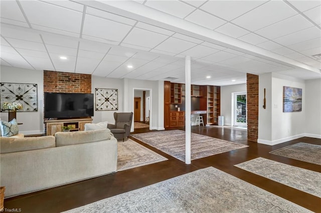 638 N Spring St, Winston-Salem, NC 27101 - living room featuring baseboards and recessed lighting