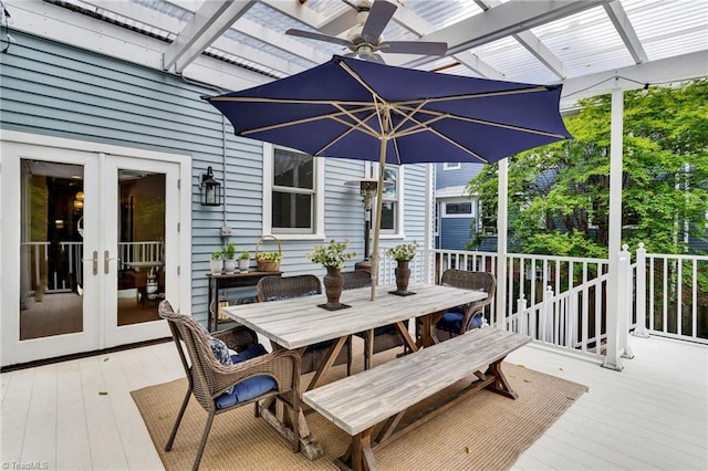 638 N Spring St, Winston-Salem, NC 27101 - wooden terrace with french doors, outdoor dining space, a pergola, and a ceiling fan