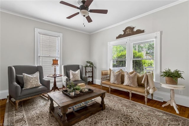 638 N Spring St, Winston-Salem, NC 27101 - living area featuring wood finished floors, ceiling fan, ornamental molding, and baseboards
