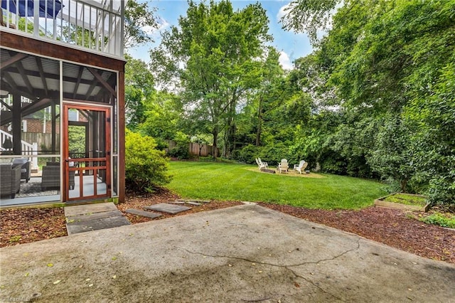 638 N Spring St, Winston-Salem, NC 27101 - view of yard featuring a patio and a sunroom