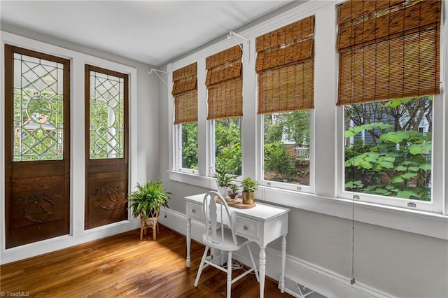 638 N Spring St, Winston-Salem, NC 27101 - sunroom / solarium with wood finished floors and baseboards