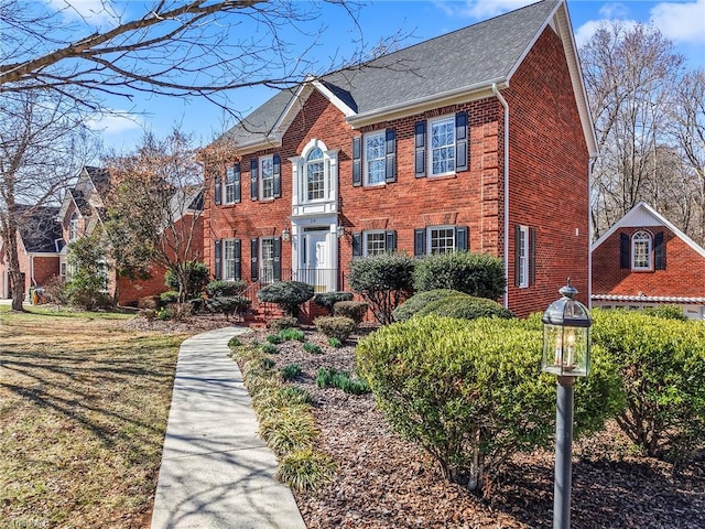 view of front of property featuring brick siding