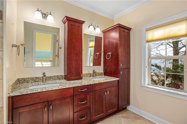 bathroom featuring ornamental molding, tile patterned flooring, and vanity