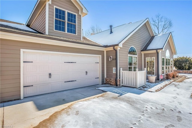 front facade with a garage