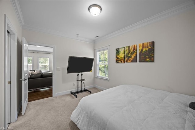 2590 Mccullum Ct, Browns Summit, NC 27214 - bedroom featuring carpet floors and crown molding