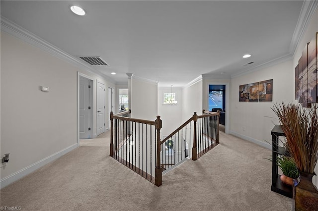 2590 Mccullum Ct, Browns Summit, NC 27214 - hall with light colored carpet, an upstairs landing, crown molding, recessed lighting, and a chandelier