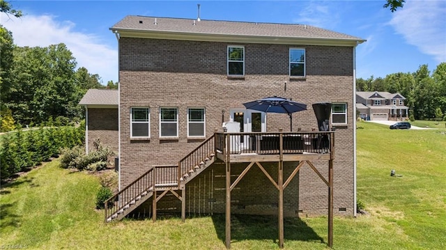 2590 Mccullum Ct, Browns Summit, NC 27214 - back of property featuring stairs, a deck, a yard, and brick siding