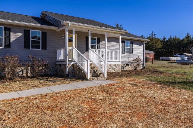 view of front of house featuring covered porch