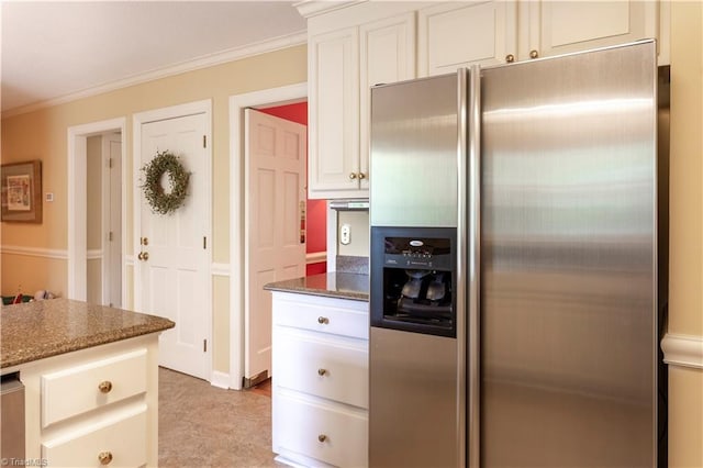 298 Duke Dr, Lexington, NC 27292 - kitchen featuring stainless steel fridge, ornamental molding, dark stone countertops, and white cabinetry