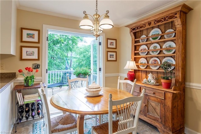 298 Duke Dr, Lexington, NC 27292 - dining space featuring crown molding and a chandelier