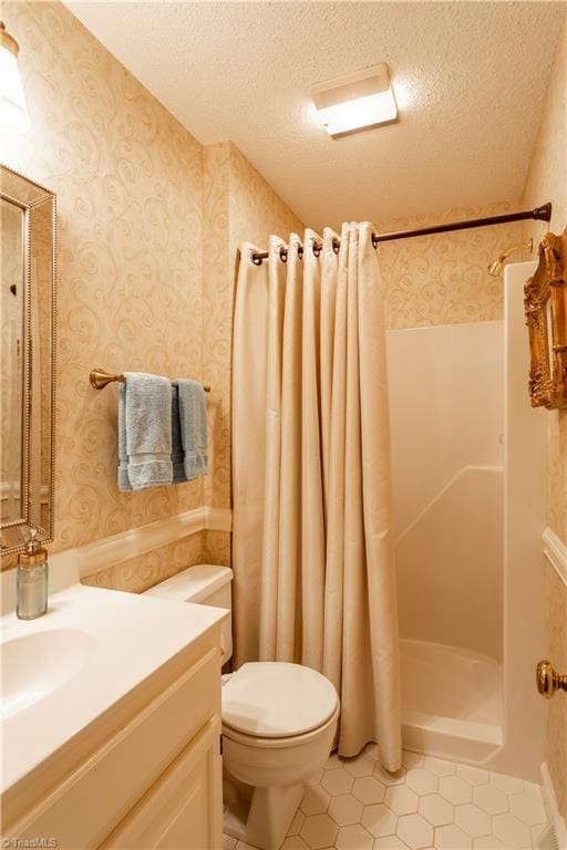 298 Duke Dr, Lexington, NC 27292 - full bathroom with vanity, tile patterned flooring, toilet, a textured ceiling, and curtained shower