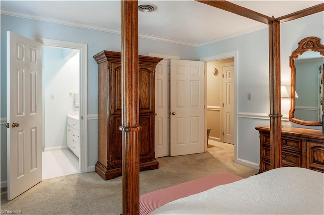 298 Duke Dr, Lexington, NC 27292 - bedroom featuring light carpet, crown molding, ensuite bathroom, and baseboards