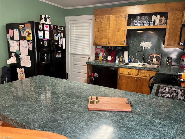 kitchen featuring backsplash, sink, black appliances, and ornamental molding