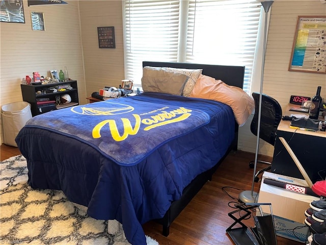 bedroom featuring dark wood-type flooring