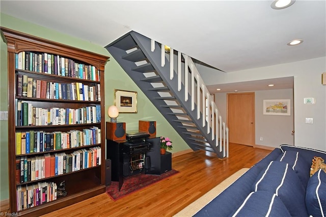 interior space with recessed lighting and wood finished floors