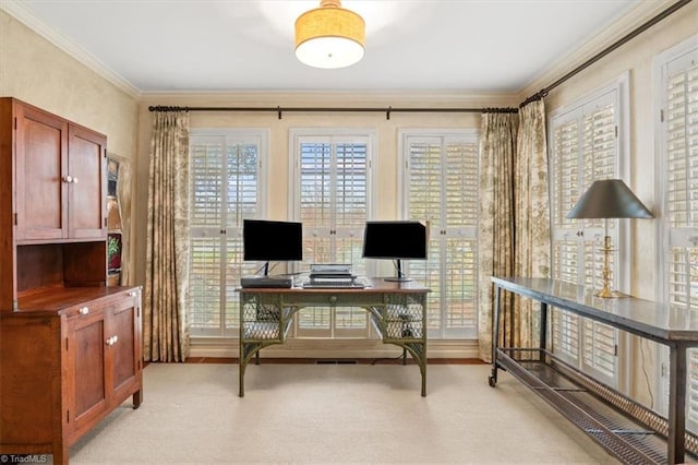 home office with light colored carpet and ornamental molding