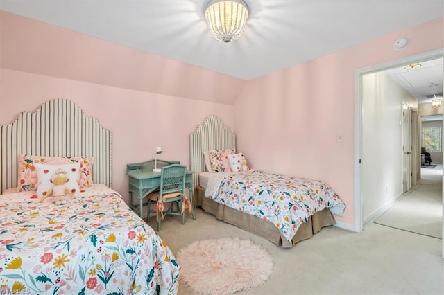 carpeted bedroom with vaulted ceiling