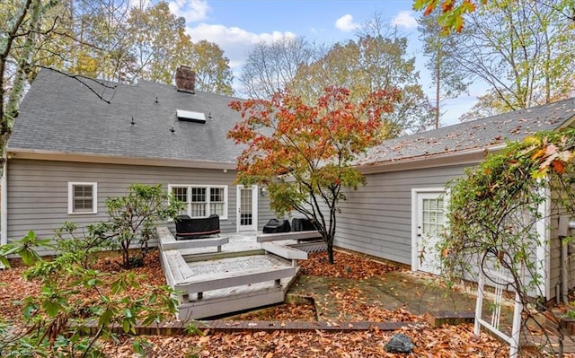 rear view of property with a patio area