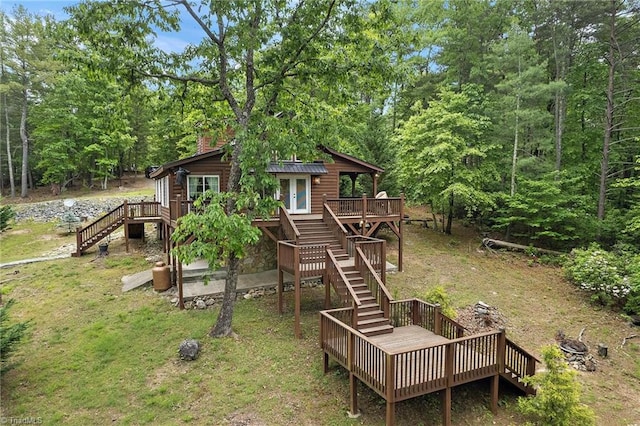 exterior space featuring a yard and a deck