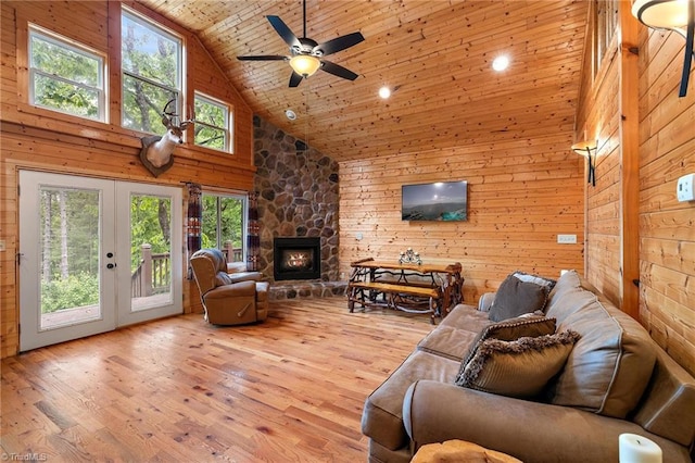 living room with ceiling fan, french doors, wooden ceiling, high vaulted ceiling, and light wood-type flooring