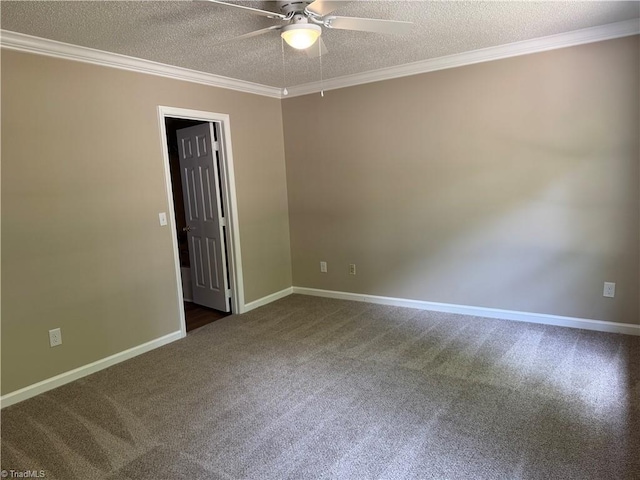 empty room with crown molding, a ceiling fan, dark colored carpet, and a textured ceiling