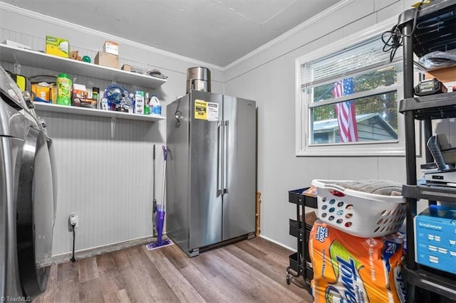 interior space with crown molding and wood-type flooring