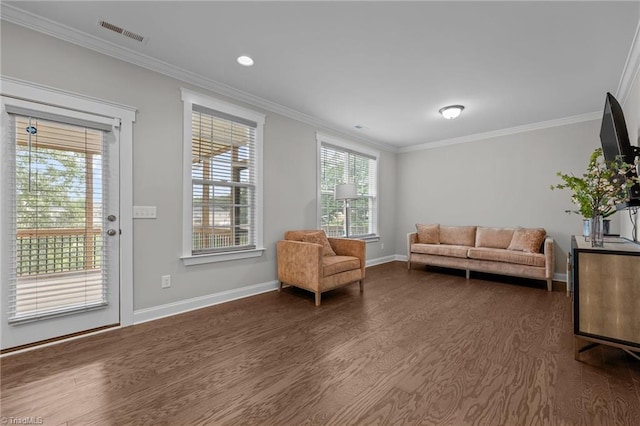 8004 Hacker Dr, Stokesdale, NC 27357 - living area featuring dark wood-style flooring, crown molding, and baseboards