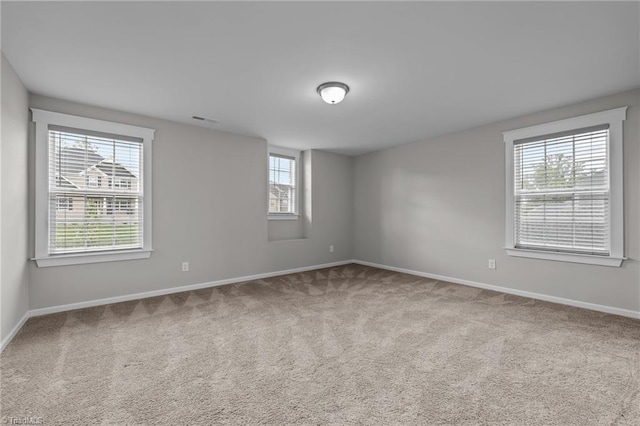 8004 Hacker Dr, Stokesdale, NC 27357 - empty room featuring baseboards and carpet