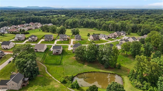 8004 Hacker Dr, Stokesdale, NC 27357 - aerial view of residential area featuring a heavily wooded area and a nearby body of water