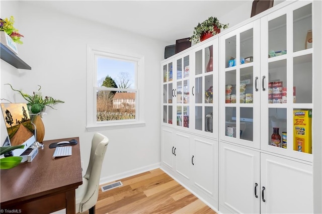 office area featuring light hardwood / wood-style flooring